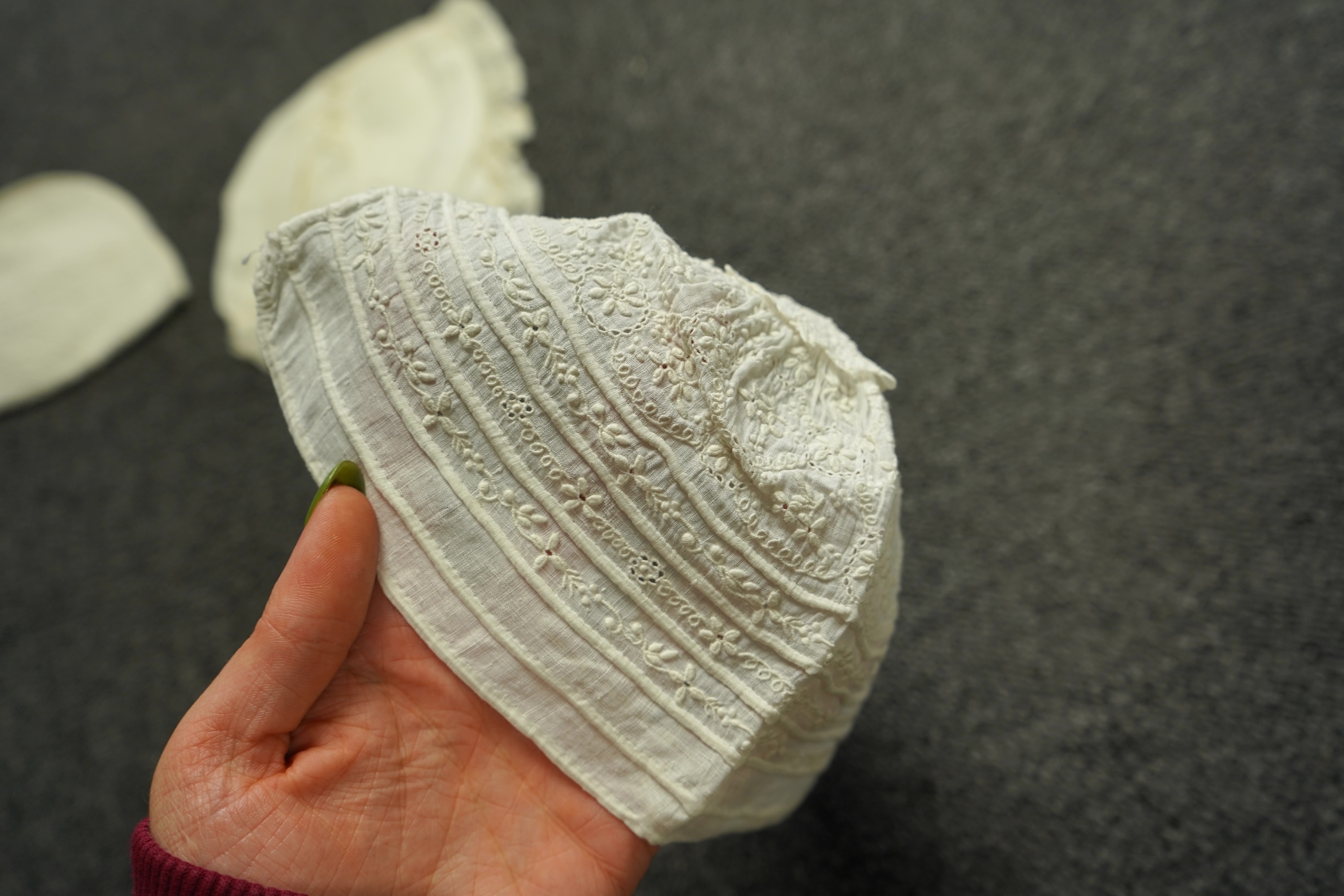 A collection of six baby’s bonnets from the mid 18th century to the late 19th century. An 18th century Hollie Point inserted baby bonnet, a quilted 18th century baby bonnet, two white work bonnets with needle lace crown